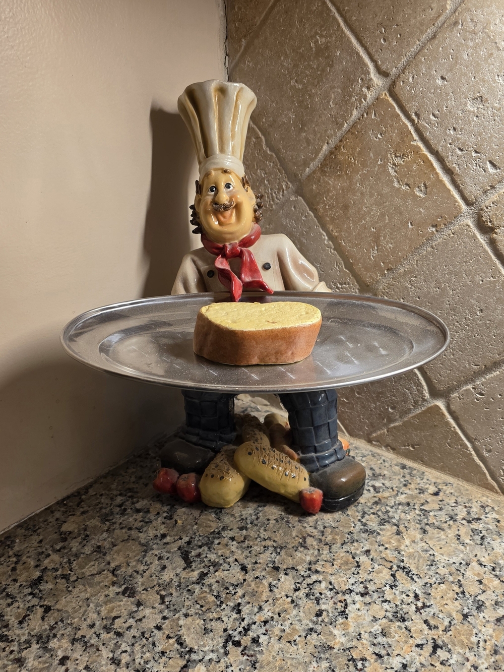 Source Unknown Cream Chef Figurine Cake Stand with Red Scarf and Silver Tray